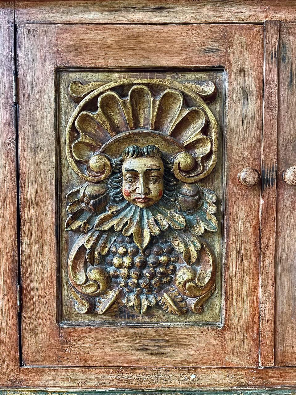 Rustic Spanish Colonial Hacienda Cabinet – Hand-Carved Faces & Floral Motifs