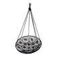 Black woven hanging chair on a white background