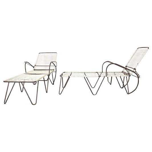 Modern outdoor lounge chair and table set on a white background