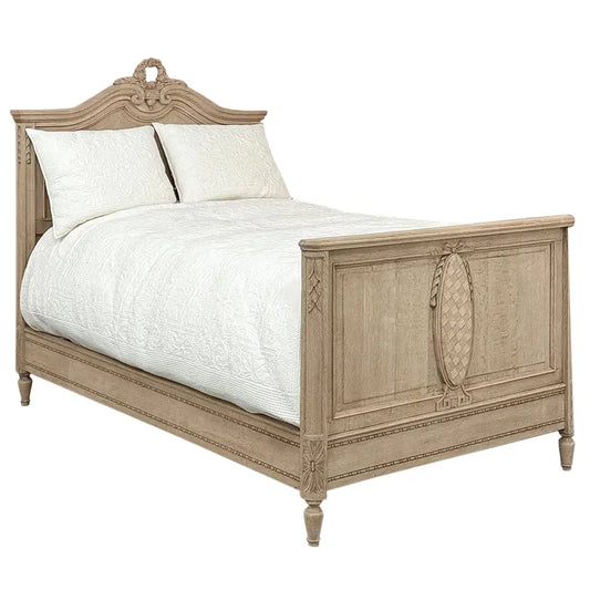 Wooden bed with intricate carvings on a white background