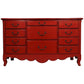 Red dresser with multiple drawers on a white background
