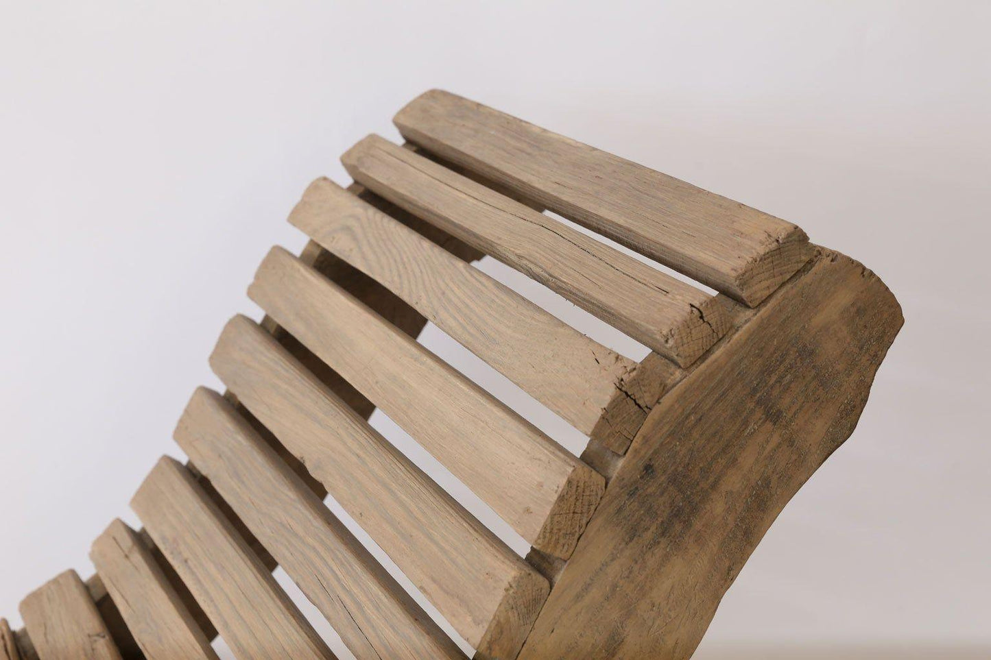 Wooden slatted bench on a white background
