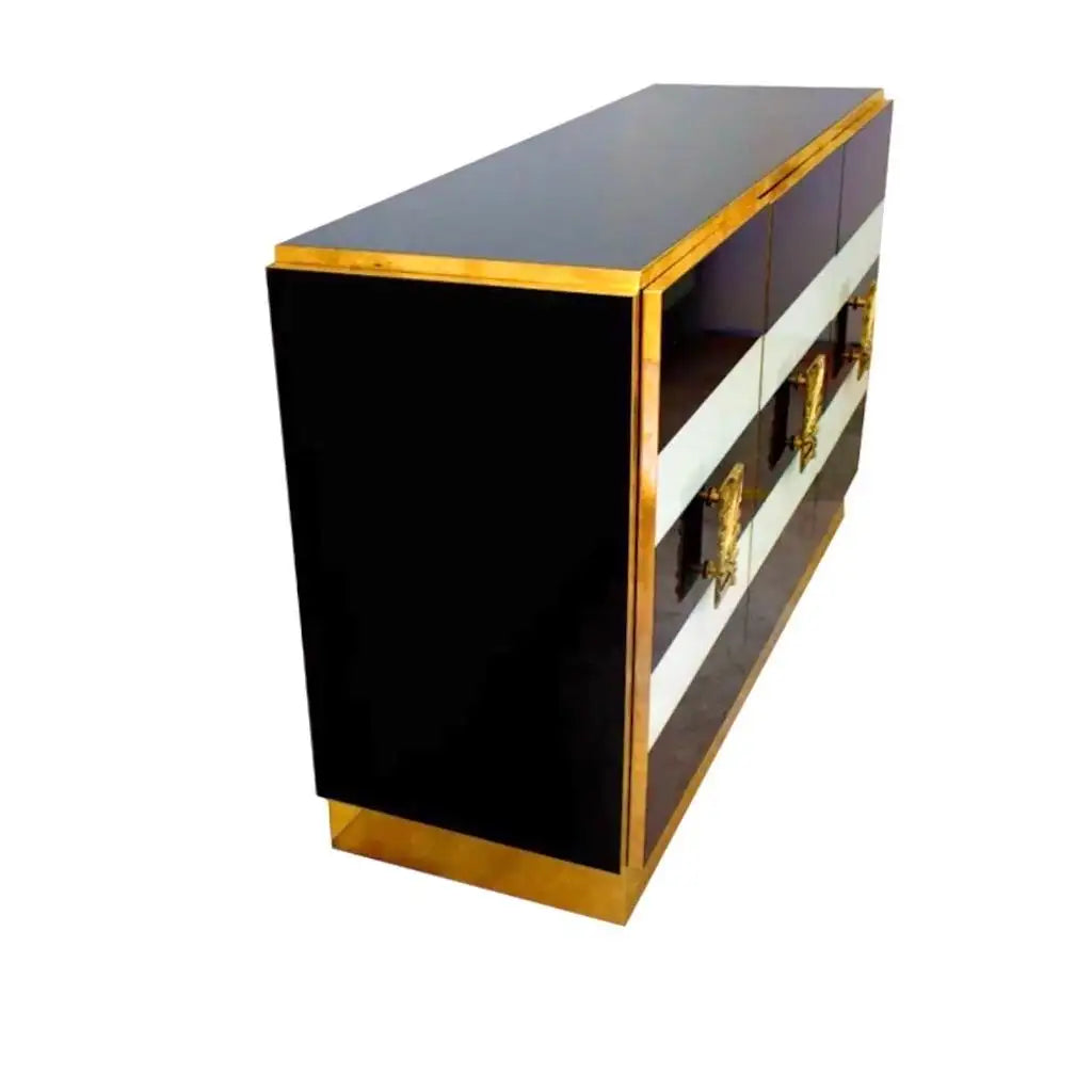 Long black and gold cabinet on a white background