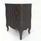Decorative wooden chest with intricate carvings on a white background