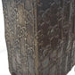 Decorative metal box with intricate patterns on a white background
