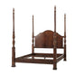 Wooden four-poster bed on a white background