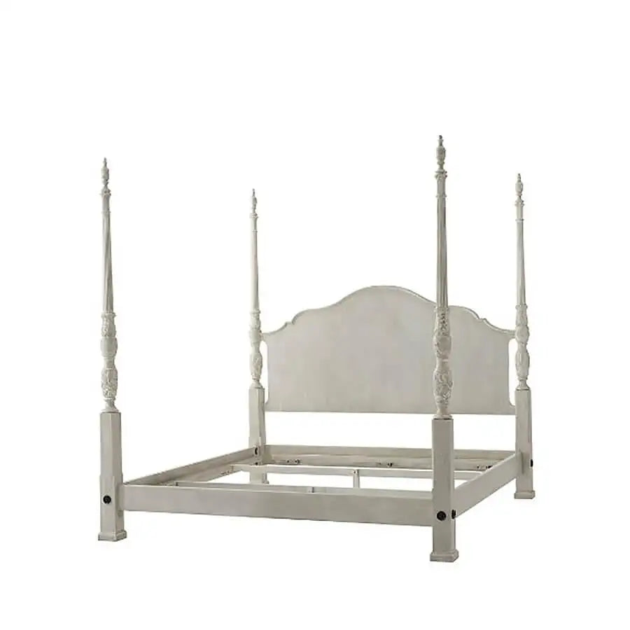 White four-poster bed on a white background