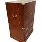 Wooden cabinet with brass handles on a white background
