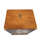 Wooden box with a star design on a white background