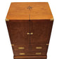 Wooden cabinet with star design on top and gold accents on a white background