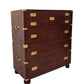 Wooden dresser with gold accents on a white background