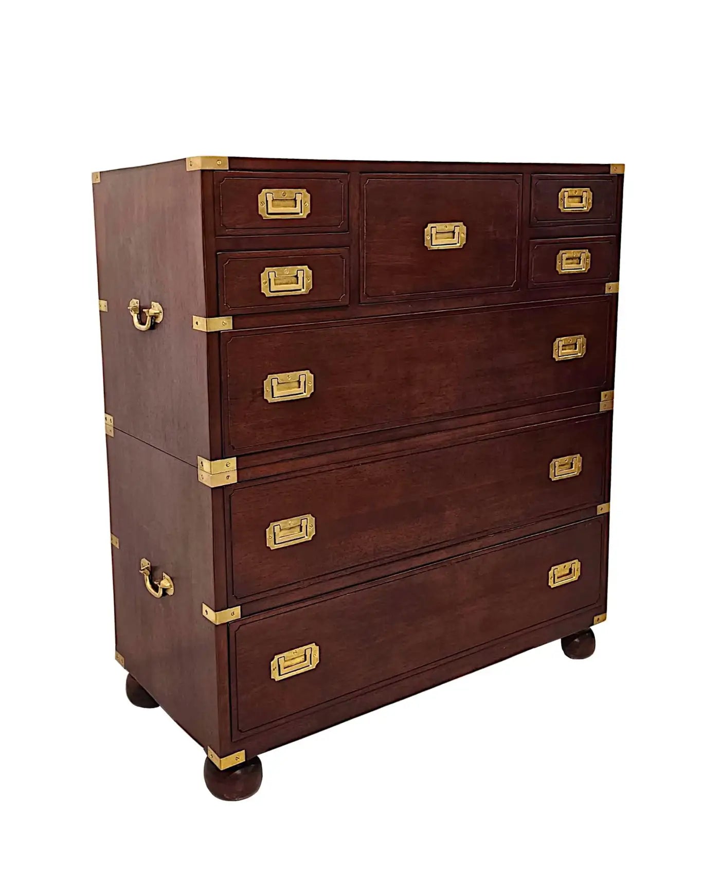 Wooden dresser with gold accents on a white background