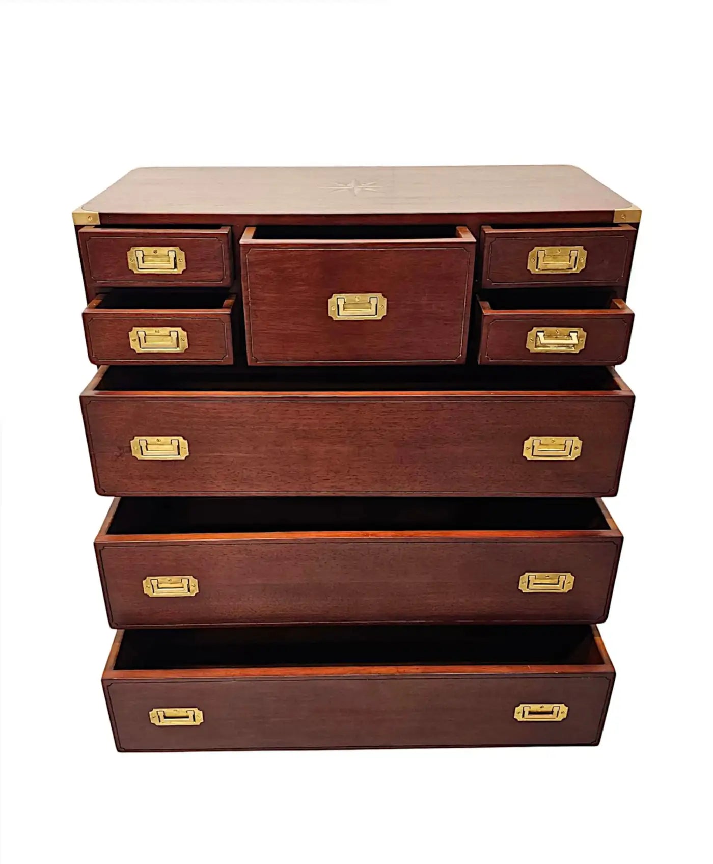 Stack of wooden boxes with brass handles on a white background