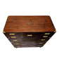 Wooden chest with brass handles and star design on a white background