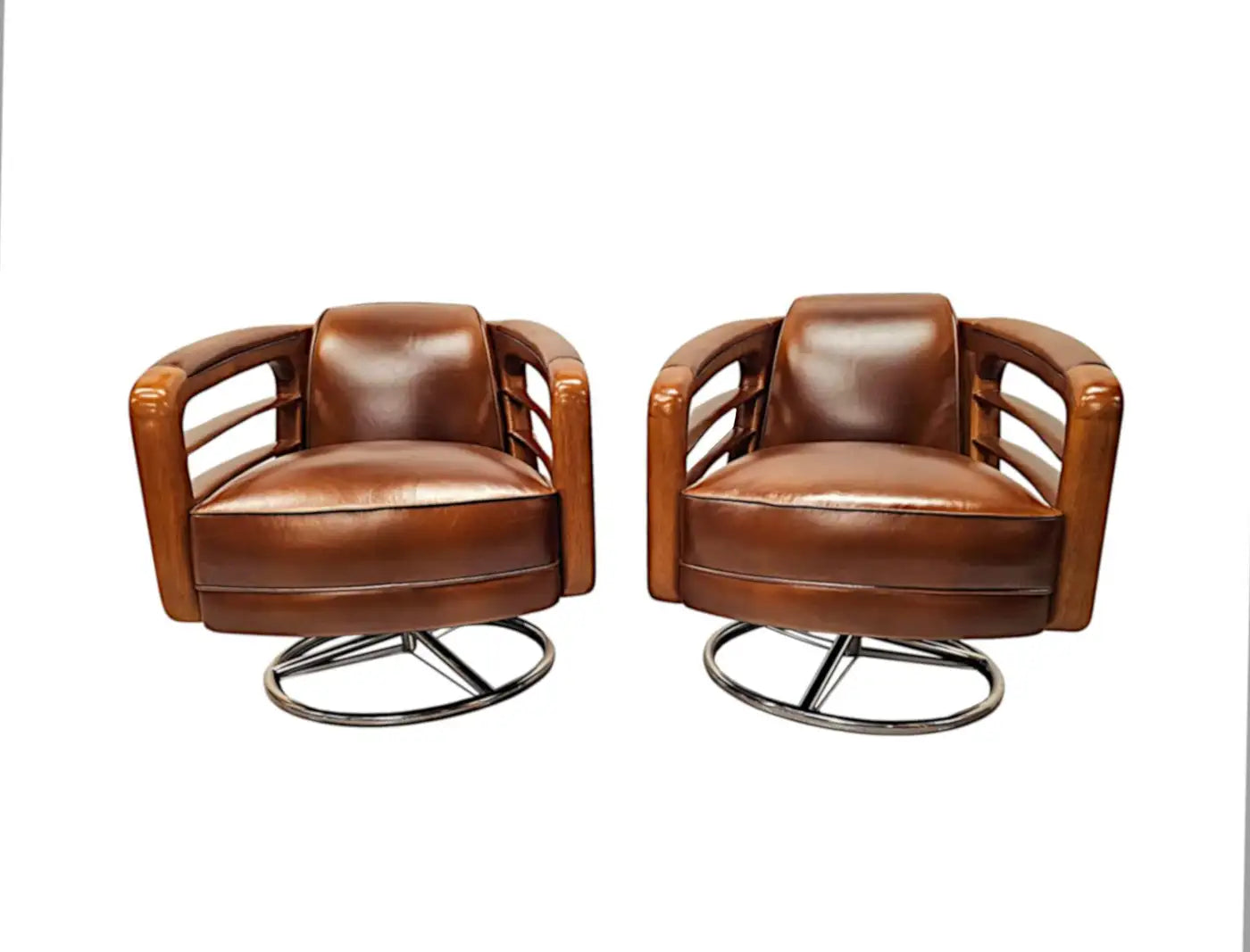 Pair of brown leather swivel chairs on a white background
