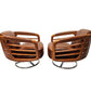 Pair of wooden swivel chairs on a white background