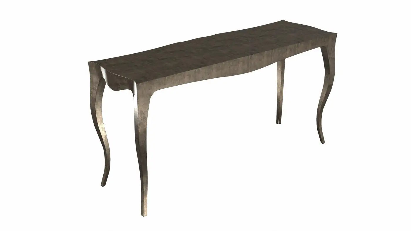 Decorative console table with a metallic finish on a white background