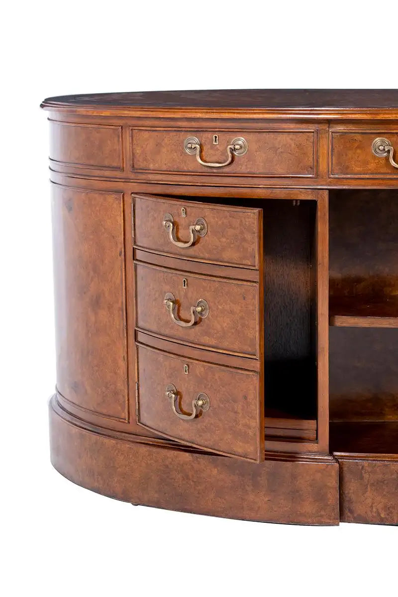 Wooden desk with multiple drawers and a white background