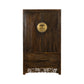 Wooden wardrobe with intricate carvings on a white background