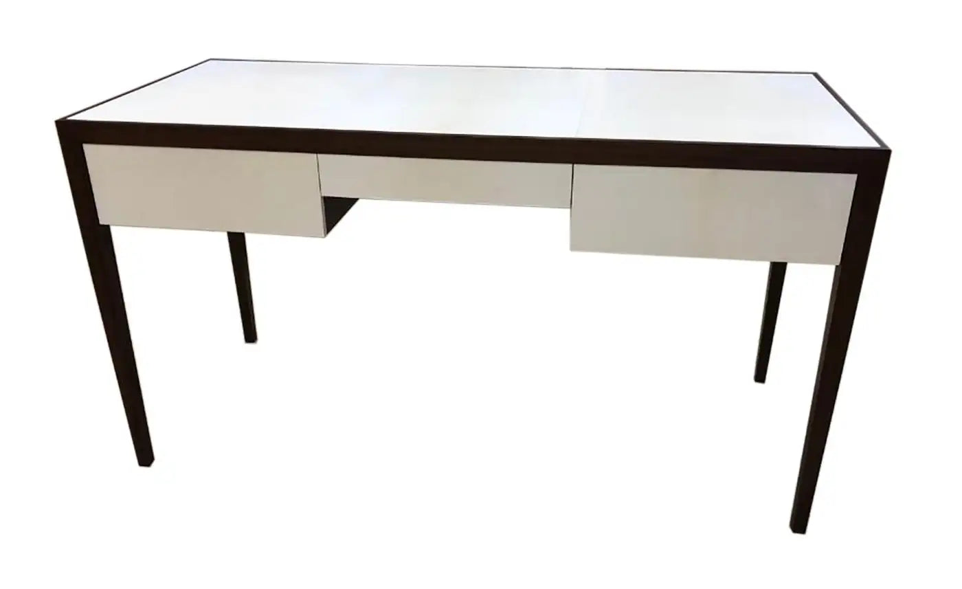 White desk with dark wood trim on a white background