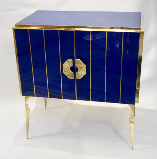 Decorative cabinet with blue lacquer and gold accents on a white background