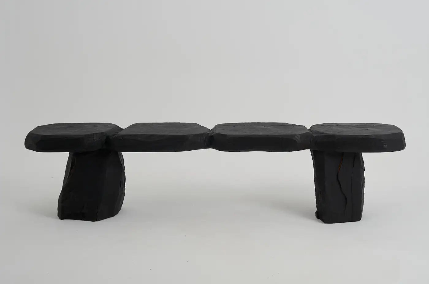 Black stone bench on a white background