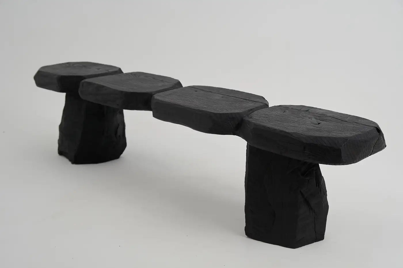 Black stone bench on a white background