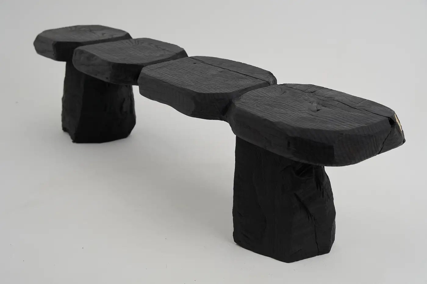 Black stone bench on a white background