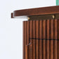 Close-up of a wooden cabinet with a white background