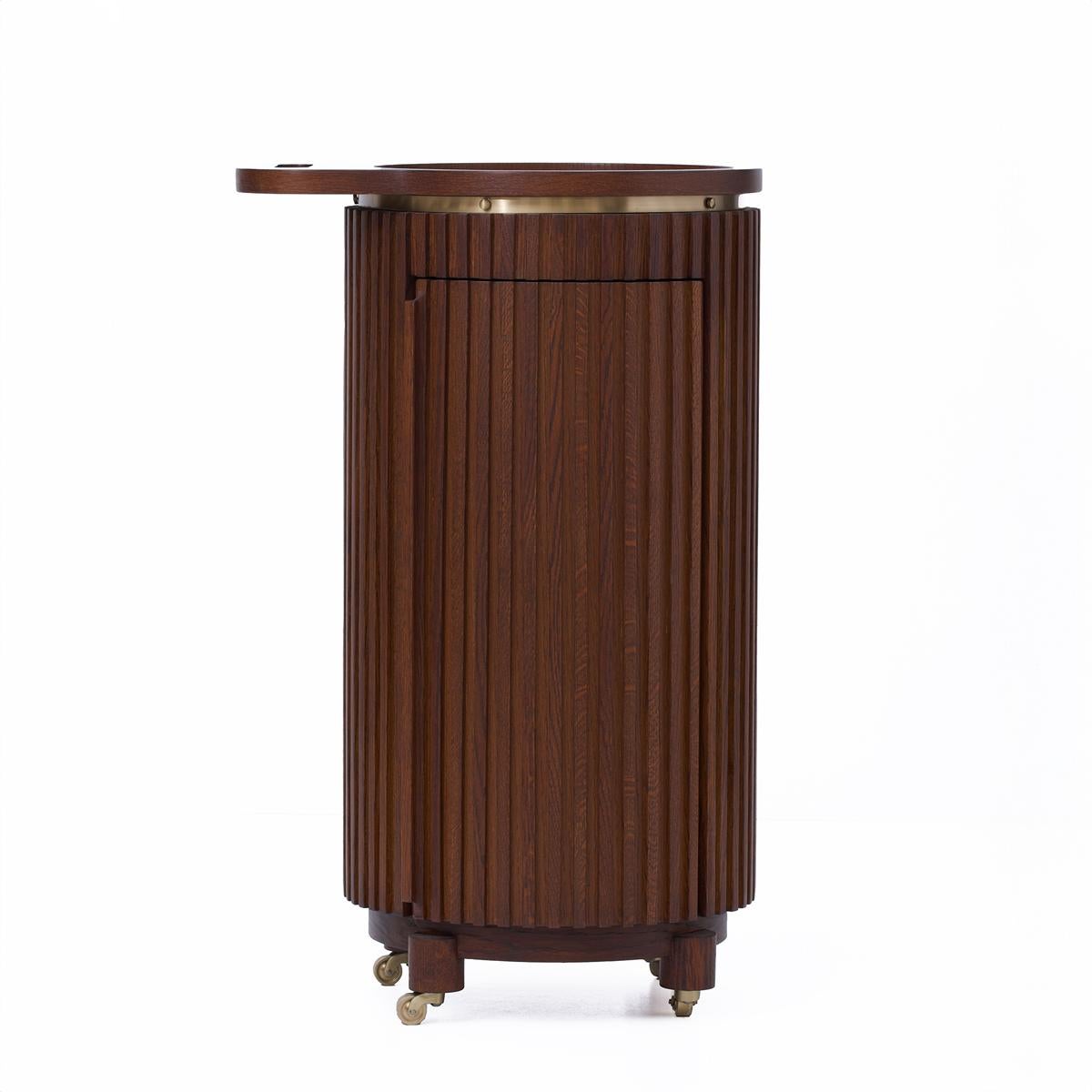 Wooden bar cart with a gold accent on a white background