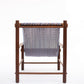 Chair with woven seat and wooden frame on a white background