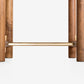 Wooden and brass towel rack on a white background