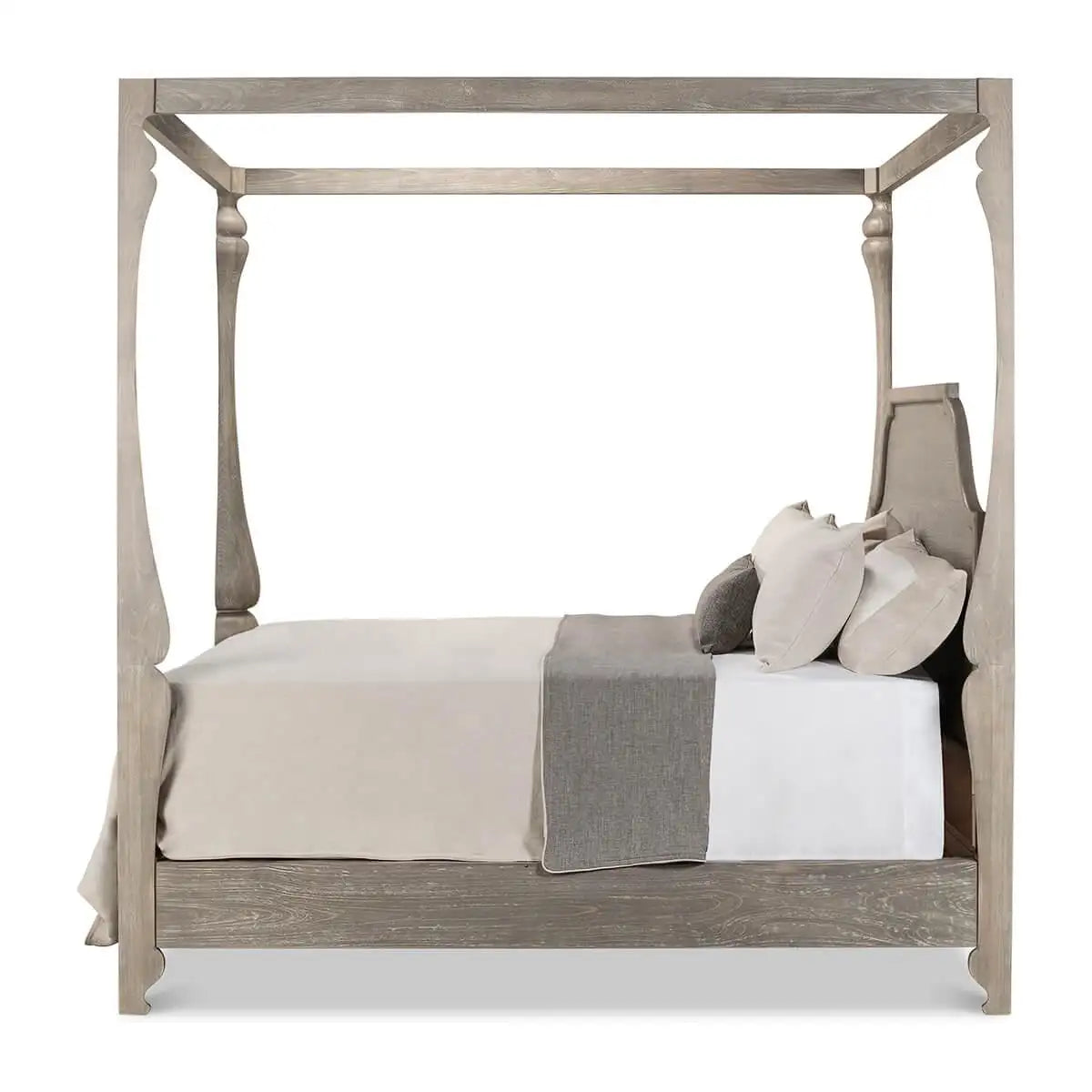 Wooden canopy bed with bedding on a white background