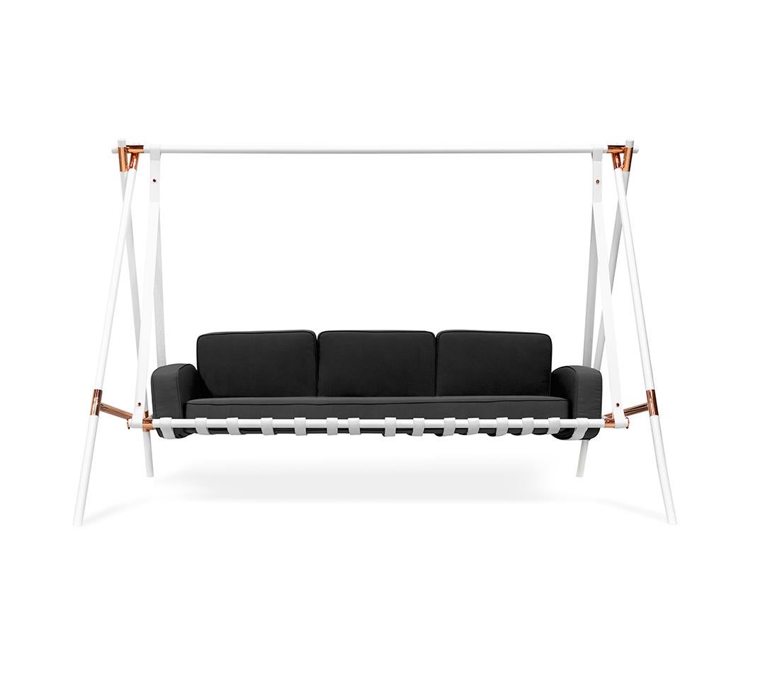 Black sofa swing with white frame and copper accents on a white background