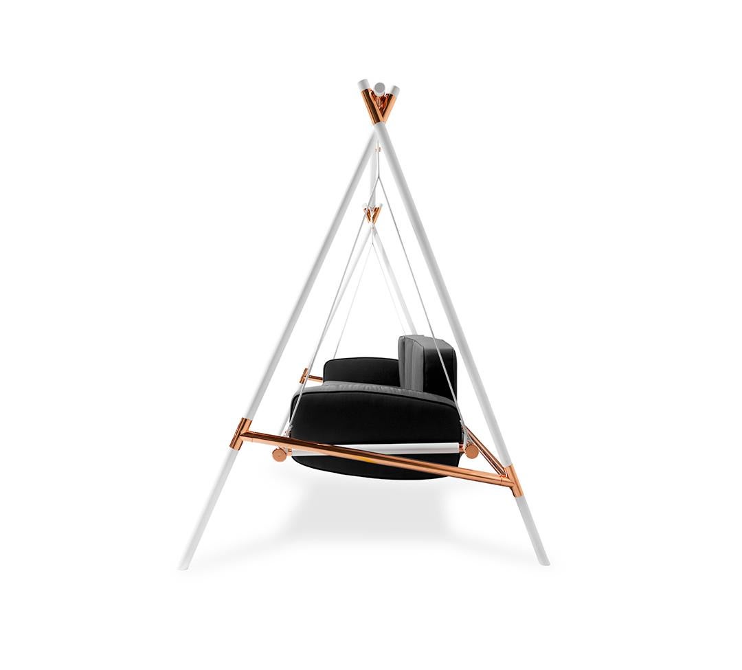 Modern hanging chair with white stand and black seat on a white background
