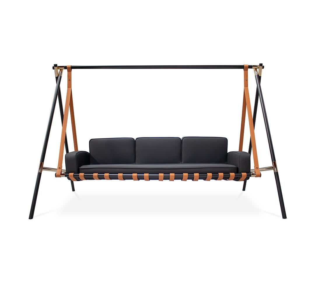 Black sofa with brown straps on a white background