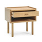Wooden side table with a drawer on a white background