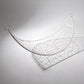 Wire hammock sculpture on a plain background
