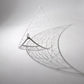 Decorative leaf sculpture with intricate patterns on a plain background