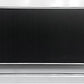 Black rectangular object with clear base on a white background