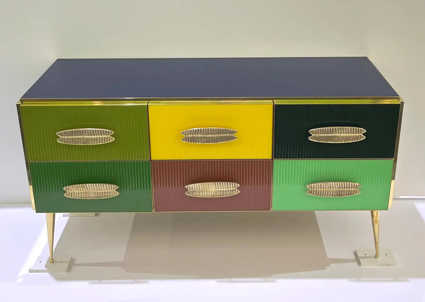 Multicolored cabinet with geometric design on a white background