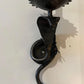 Pair of electrified Serpent Sconces finish in a gunmetal wrought iron finish