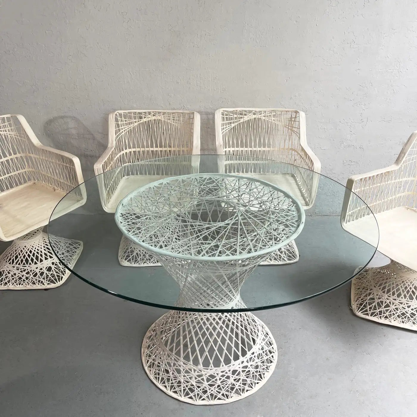 Woven Fiberglass Patio Dining Set with Ottomans