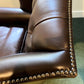 Oversized English Leather Wing Armchair with Mahogany Ball and Claw Legs