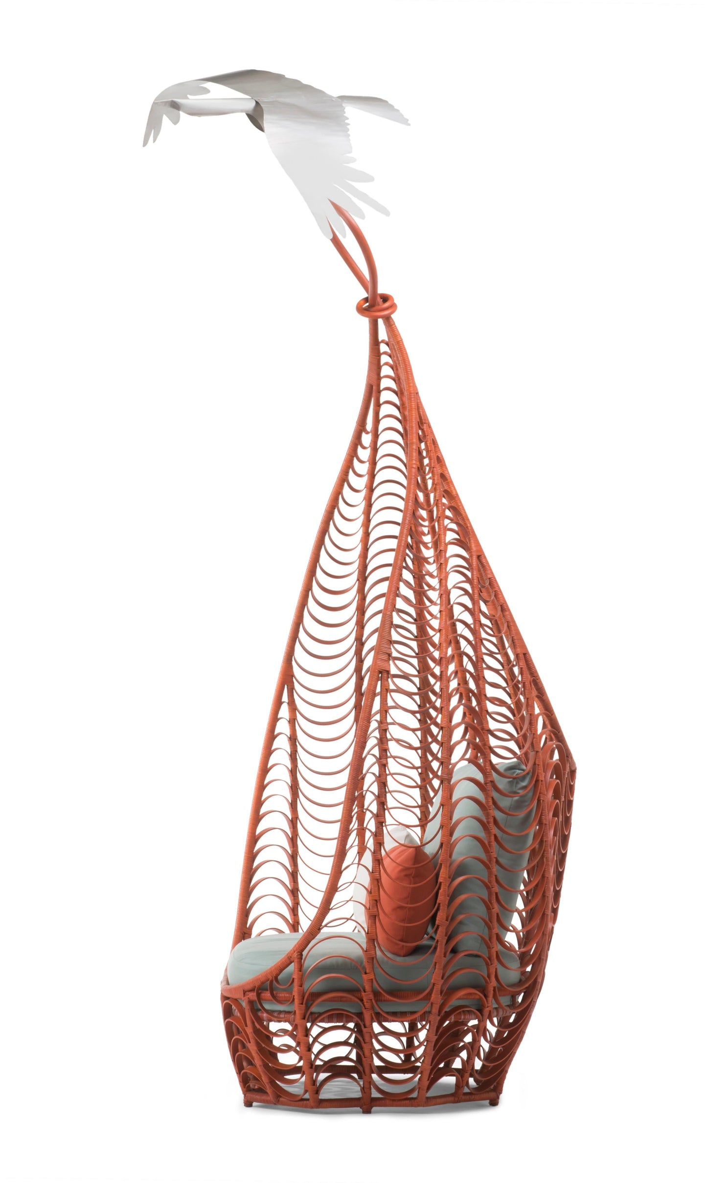 Hanging chair with orange rope and white cushion on a white background
