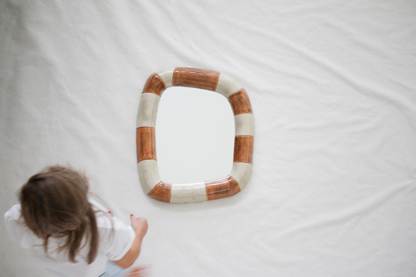 Echoe Mirror in Terracotta Cast Stone Frame