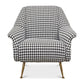 Chair with houndstooth pattern and gold legs on a white background