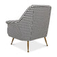 Chair with houndstooth pattern and gold legs on a white background