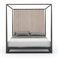 Black metal canopy bed with gray bedding on a white background