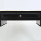 Black desk with a star emblem on a white background